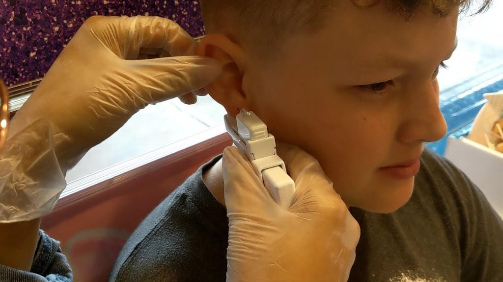 Body Contouring Spa Montreal Ear Piercing Montreal Boy Getting Ear Pierced 1024x576 